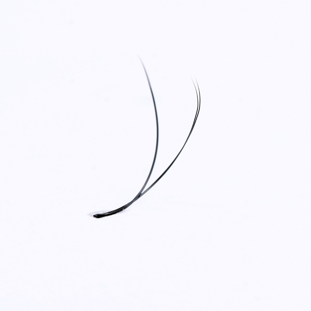 Single pre-made fan lash extension displaying lightweight individual lashes