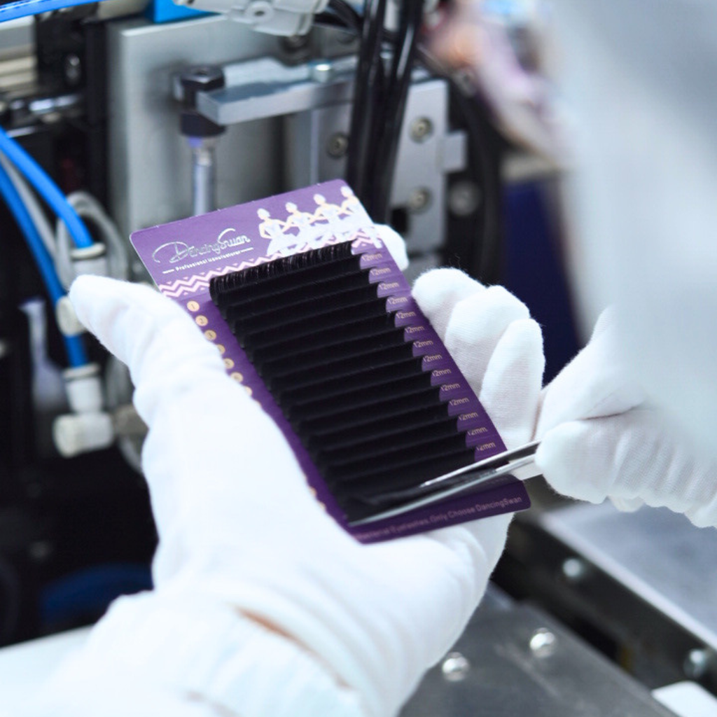 Workers performing hand inspection of eyelash extensions