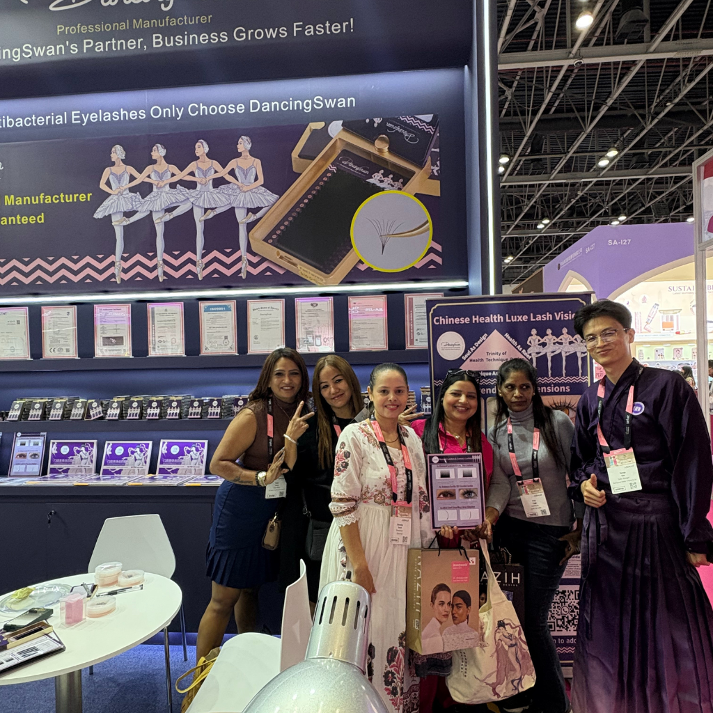 Photo with international lash brand partners at exhibition