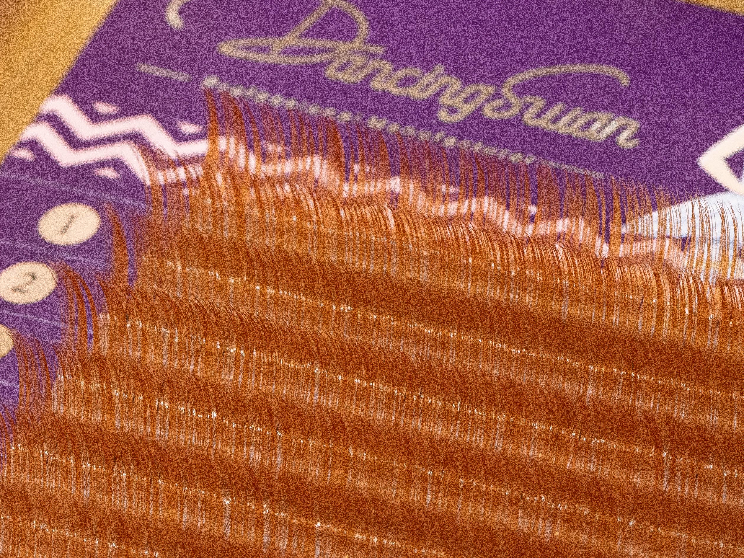 Light brown eyelashes with soft, wispy finish